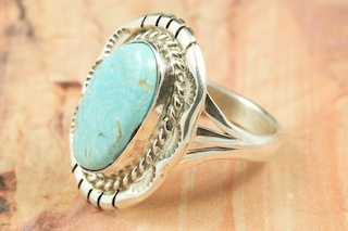 Genuine Turquoise Mountain Mine Turquoise set in Sterling Silver Ring. The Turquoise Mountain Mine is located in the Mineral Park Mining District, Mohave County, Arizona. Although Turquoise Mountain is located near the Kingman Turquoise Mine it is considered a classic mine in its own right because the Turquoise is so different in appearance. It is also known as 